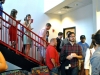 Former Red & Black staff members return from the newsroom immediately before the first statement began at an open house at The Red & Black on Friday. Photo by Porter McLeod.